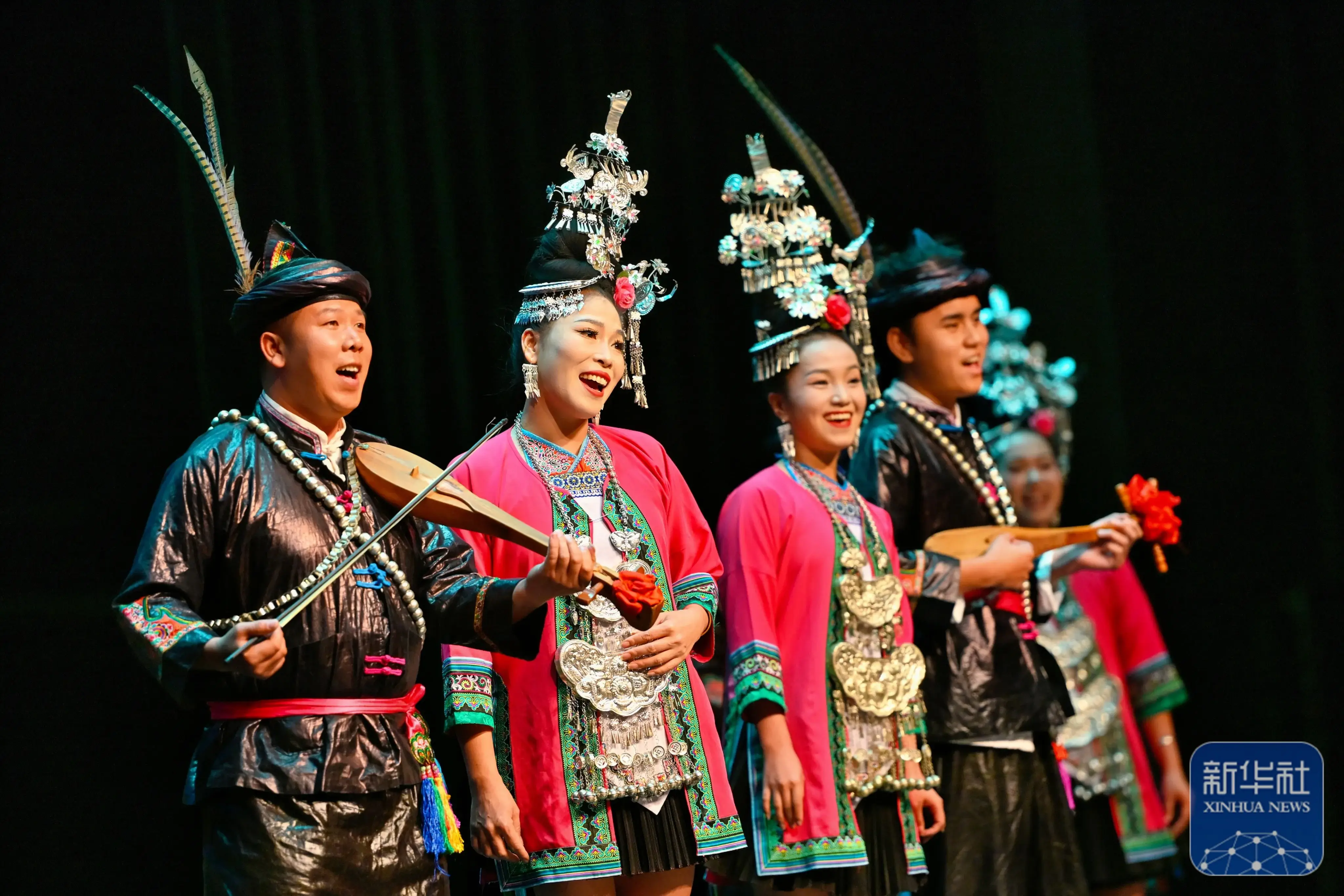 Dong Grand Chorus performance, with Dong villagers in traditional costumes singing