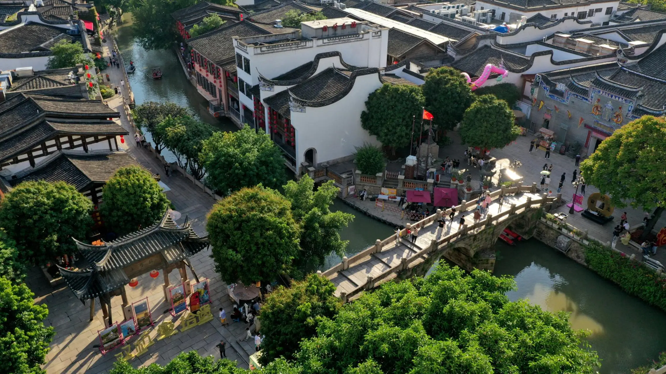 Panoramic view of Nanxun Ancient Town, showing the Jiangnan water town scenery with small bridges and flowing water
