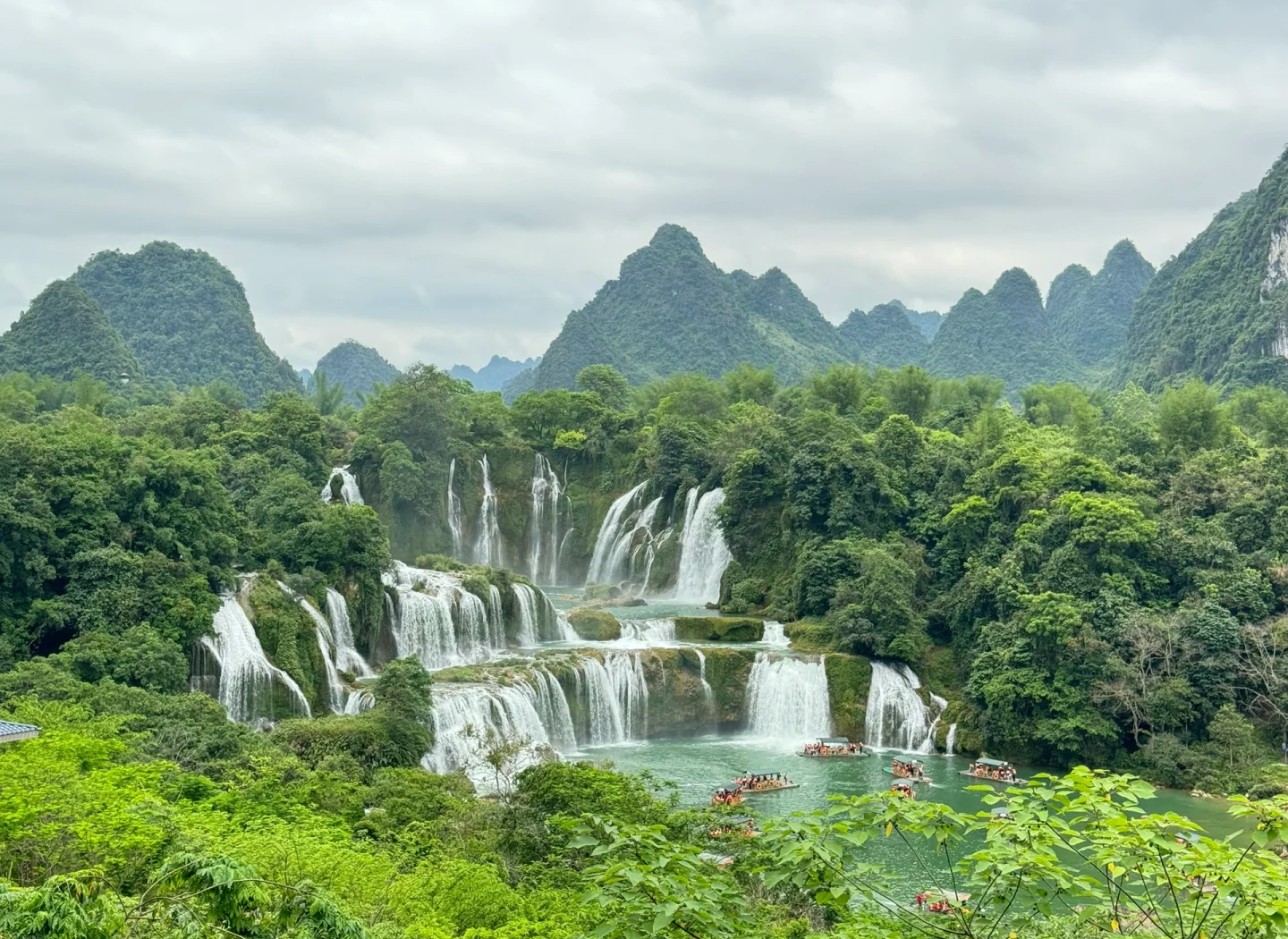 Panoramic view of karst peaks in Chongzuo, Guangxi, with clear rivers winding through and mountain reflections in the water